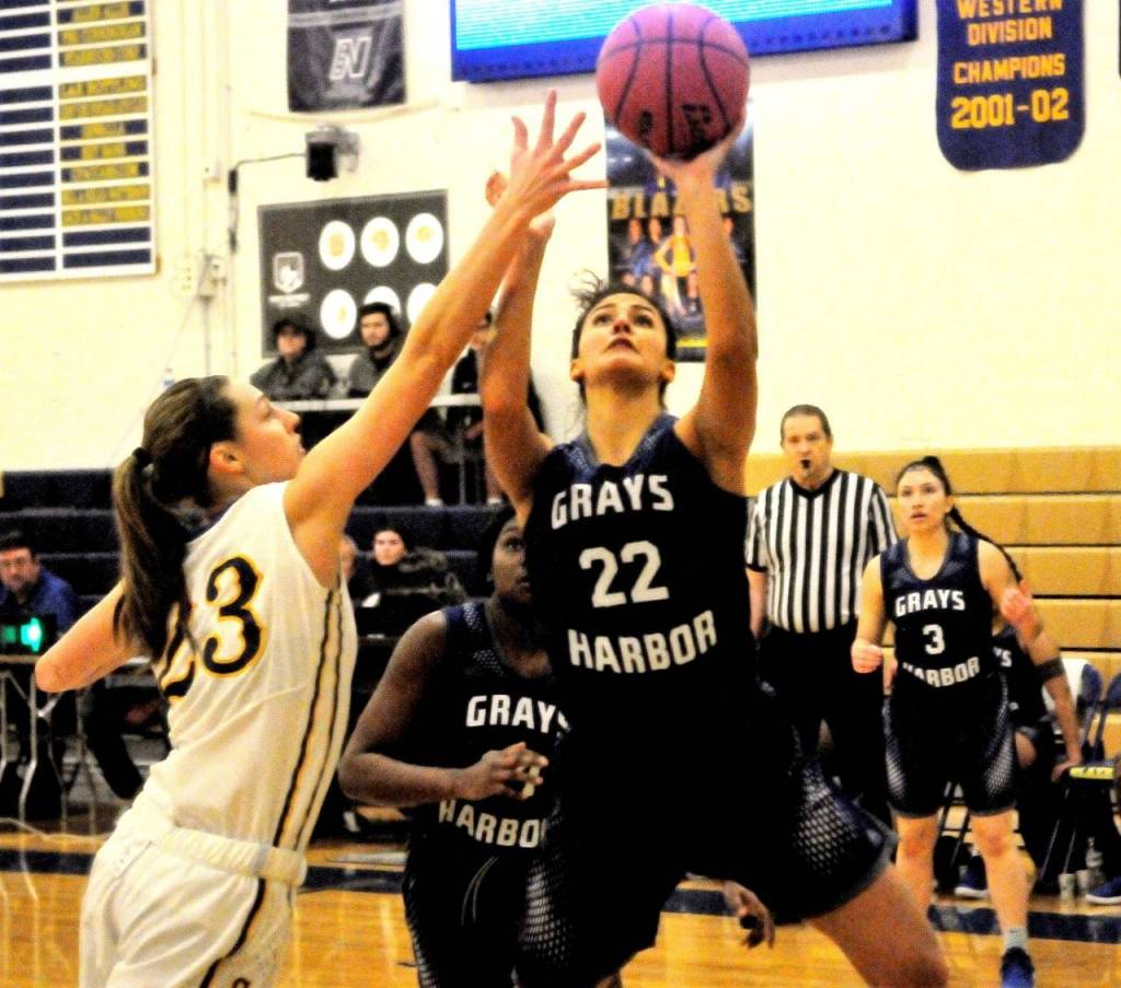 Grays Harbors Isabel Hernandez (22) hits a layup in the third quarter against Centralia on Wednesday night. (Hasani Grayson | Grays Harbor News Group)