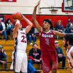 Hoquiams Rayyon Dyaton, right, comes over to contest a shot from Teninos Logan Brewer on Friday night. (Jared Wenzelburger | Centralia Chronicle)