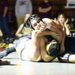 Willapa Harbors Christian Anderson, top, works to pin Aberdeens Enrique Ontiveros during the heavyweight final of the Grizzly Alumni Invitational on Saturday in Hoquiam. (Photo by Sue Michalak)