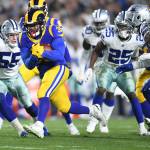 Los Angeles Rams running back C.J. Anderson picks up yards against the Dallas Cowboys in the first quarter during the NFL Divisional Round at the Los Angeles Memorial Coliseum on Saturday, Jan. 12, 2019. The Rams advanced, 30-22. (Wally Skalij/Los Angeles Times/TNS)