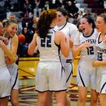 Montesano players celebrate at half court after the final buzzer in a 45-30 win over Elma on Tuesday. (Hasani Grayson | Grays Harbor News Group)