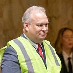 COURTESY LEGISLATIVE PHOTOGRAPHY                                Rep. Jim Walsh, R-Aberdeen, donned a yellow safety vest ahead of Gov. Jay Inslees State of the State Address Tuesday to protest the Governors proposed carbon tax.
