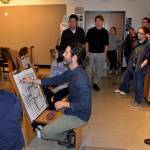 Louis Krauss | Grays Harbor News Group                                Art instructor Nathan Barnes demonstrates how to incorporate the rooms dimensions during a drawing class at Grays Harbor College.