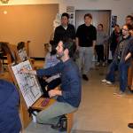 Louis Krauss | Grays Harbor News Group                                Art instructor Nathan Barnes demonstrates how to incorporate the rooms dimensions during a drawing class at Grays Harbor College.