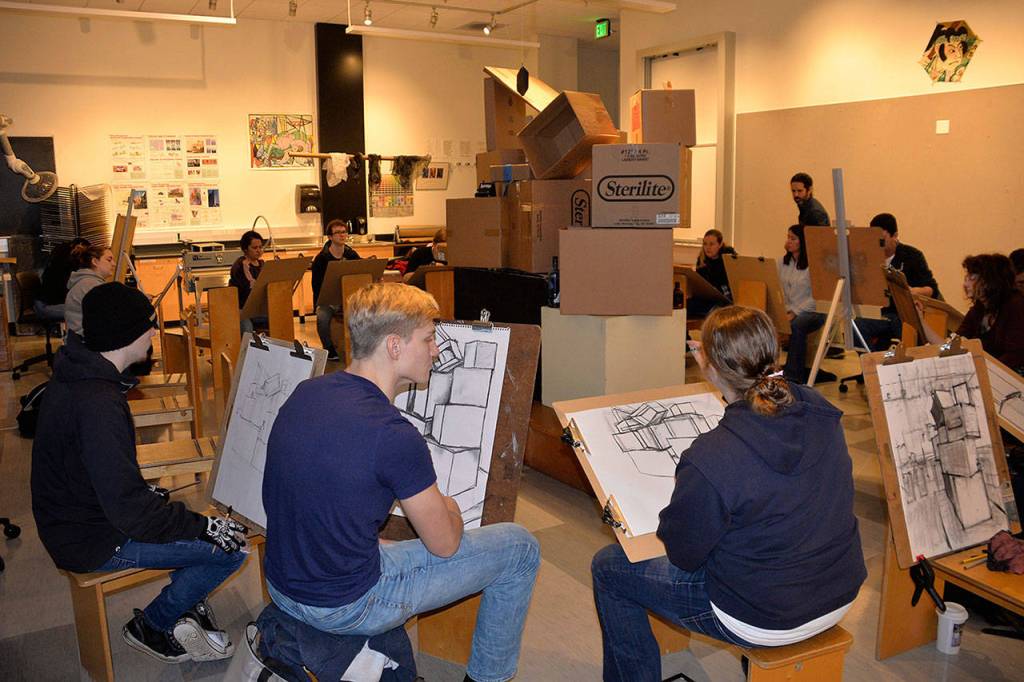 Louis Krauss | Grays Harbor News Group                                Students draw a stack of boxes during a class at Grays Harbor College last week.