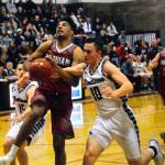 Montesanos Ben Estes, right, knocks the ball out of the hands of Hoquiams Rayyon Dayton in the third quarter on Friday. (Hasani Grayson | Grays Harbor News Group)