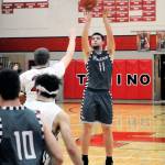 Montesanos Tanner Nicklas hits a mid-range jumper against Tenino on Tuesday. Nikclas put up eight points in Montesanos 57-37 win. (Hasani Grayson | Grays Harbor News Group)