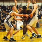 Montesanos Shaydon Farmer, left, and Tanner Nicklas, right, double try to steal the ball from Forks Trey Baysinger. (Hasani Grayson | Grays Harbor News Group)