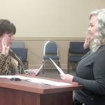 DAN HAMMOCK | GRAYS HARBOR NEWS GROUP                                Mary Stinchfield, left, is sworn in to the Hoquiam City Council Ward 6 position by Hoquiam Mayor Jasmine Dickhoff Monday. She replaces Angela Forkum who resigned in December to focus on family matters.