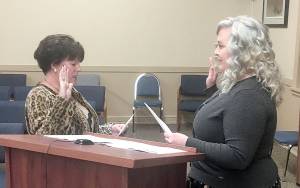 DAN HAMMOCK | GRAYS HARBOR NEWS GROUP                                Mary Stinchfield, left, is sworn in to the Hoquiam City Council Ward 6 position by Hoquiam Mayor Jasmine Dickhoff Monday. She replaces Angela Forkum who resigned in December to focus on family matters.