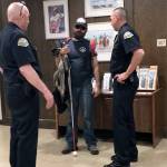 Louis Krauss | Grays Harbor News Group                                Mike Nelson, middle, from Blind Justice, speaks with Aberdeen Deputy Police Chief Dave Timmons, left, and Chief Steve Shumate.