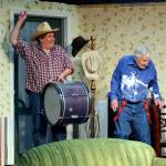 Jim (Matthew Kline) is more enthusiastic than his father H.C. (Dave Foscue) in trying to implement Starbucks instructions on how to drum up some long-needed rain. (Photo by Keith Krueger)