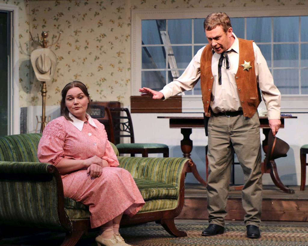 File (Ed Logue) tries to explain to Lizzie (Stacy Murphy) why he doesnt think they belong together. (Photo by Keith Krueger)