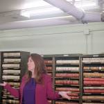 Emma Scher | Washington Newspaper Publishers Association                                Secretary of State Kim Wyman, inside the Washington State Archive building, discusses problems the building has been having with leaking pipes last month in Olympia. The pipe above her head has leaked water in the past. The room stores county records. The building was built in 1962