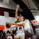 Raymonds Carl Enslow attempts a layup in the third quarter against Morton-White Pass on Tuesday. (Hasani Grayson | Grays Harbor News Group)