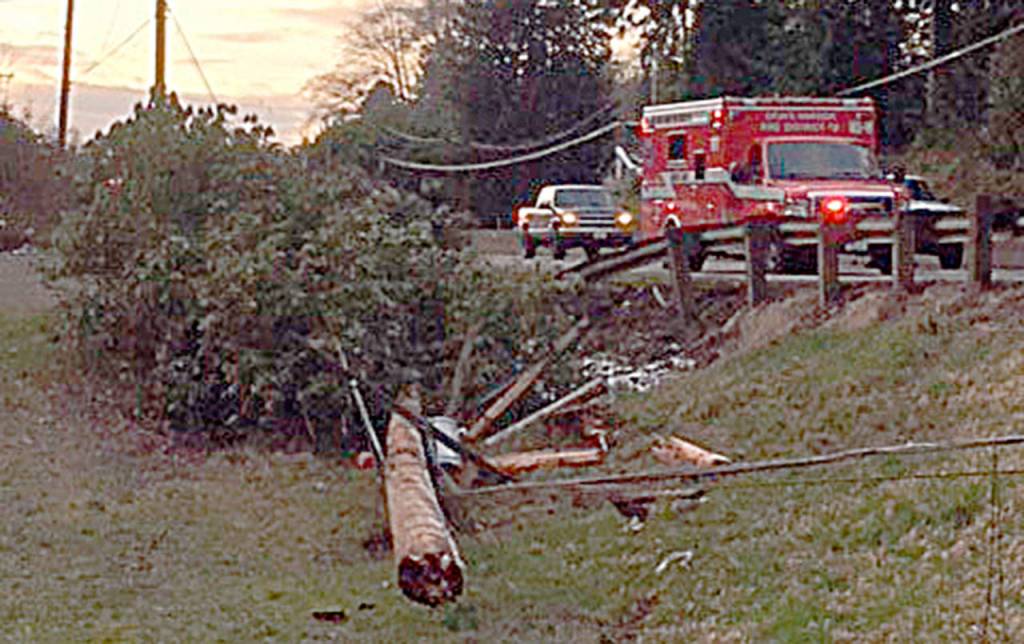 COURTESY WASHINGTON STATE PATROL                                A power pole and tree were taken out by an SUV on eastbound Highway 12 in Central Park Tuesday afternoon, knocking out power to more than 7,000 PUD customers from Aberdeen to Montesano.