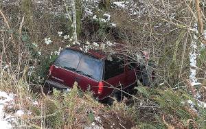 COURTESY WASHINGTON STATE PATROL                                An SUV hit a guardrail and sheared off a power pole on eastbound Highway 12 near Pioneer Road in Central Park Tuesday afternoon before coming to a rest against a tree some 80 yards off the road. More than 7,000 PUD customers lost power as a result.