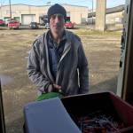(Louis Krauss | Grays Harbor News Group) Jeff Simmons stands outside of the syringe exchange motorhome in downtown Aberdeen after discarding some needles.