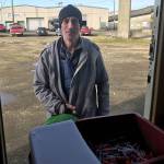 (Louis Krauss | Grays Harbor News Group) Jeff Simmons stands outside of the syringe exchange motorhome in downtown Aberdeen after discarding some needles.