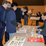 Louis Krauss | Grays Harbor News Week                                During Wednesdays Mad City Money event at Aberdeen High School, Derrick Schlaht, right, advises students that they should spend their money on Fun Stuff like carnival trips and concerts.