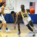 Jordan Gardner, right, drives to the hoop after getting a screen from Carl Fsicher, left, in the second half against Centralia. (Hasani Grayson | Grays Harbor News Group)