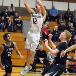 Montesanos Sam Winter (12) scores two of his game-high 22 points during the first half of Thursdays district-playoff win over Seton Catholic. (Ryan Sparks | Grays Harbor News Group)