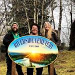 Showing off the new Riverside Cemetery sign are Matthew Shirley, Deborah Sturgill and Tina Kebow. (Jon Evers)