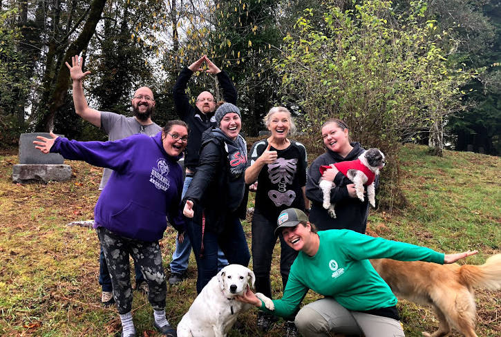 The AmeriCorps volunteers who helped make a difference at the Riverside Cemetery. Back row, from left: Matthew Shirley and Travis Winn. Middle row: Heidi Underhill, Mackenzie Trotter, Tina Kebow and Michelle Monroe (holding Spike). Front row: Poppy, Mercedes Lamphier and neighbors dog visiting cemetery. Not pictured: Myranda Curtis. (Deborah Sturgill)
