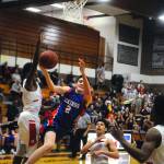 Willapa Valleys Logan Walker hits a layup while being fouled in the fourth quarter. Walker converted on the and-one opportunity to tie the game at 55-55 on Friday. (Hasani Grayson | Grays Harbor News Group)