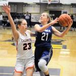 Elmas Kayli Johnson scores on a fast break layup against Cashmeres Riley Johnson on Friday. Elma lost the 1A Regional Playoff game 47-34. (Hasani Grayson | Grays Harbor News Group)