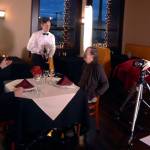 (Courtesy photo) Aria films a scene at the former Corteses restaurant in Aberdeen, with Cal Hastings (played by Russell Wiitala), left, and Frank Blakely (Bob Parks) being served by JR Morgan as the waiter.