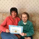 Photo courtesy of Eric Harrison                                Jan Pellegrini, left, and her aunt Mary Mihovilich hold up Mihovolichs bond from 1980 that she put into Rainier National Bank that shes been unable to recover.