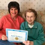 Photo courtesy of Eric Harrison                                Jan Pellegrini, left, and her aunt Mary Mihovilich hold up Mihovolichs bond from 1980 that she put into Rainier National Bank that shes been unable to recover.