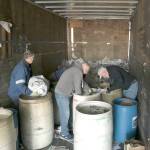 (Courtesy photo) From left, Aberdeen Lions Greg Johnstone, Mike Welliver and Steve Beck transfer paper from collection bins into the trailer.