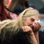 Beth Hynek reacts as family members talks about Julie Knetchel, an Everett mother who was shot to death while trying to protect her son from armed intruders. (Andy Bronson / The Herald)