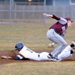 Aberdeens Christian Fraley slides in safely ahead of the tag of Montesanos Braden Dohrmann during Montesanos 15-3 win at Jack Waite Field on Thursday. (Ryan Sparks | Grays Harbor News Group)