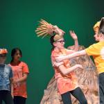 (Photo by Tifanie Kelly) Simba confronts Scar as the hyenas hold Zazu back. From left are Jesus Gonzales-Estrada, Olivia Aube, Mia Tifanny (Zazu), Bianca Lopez, Keara Burns (Scar), and Abby Lawson (Simba).
