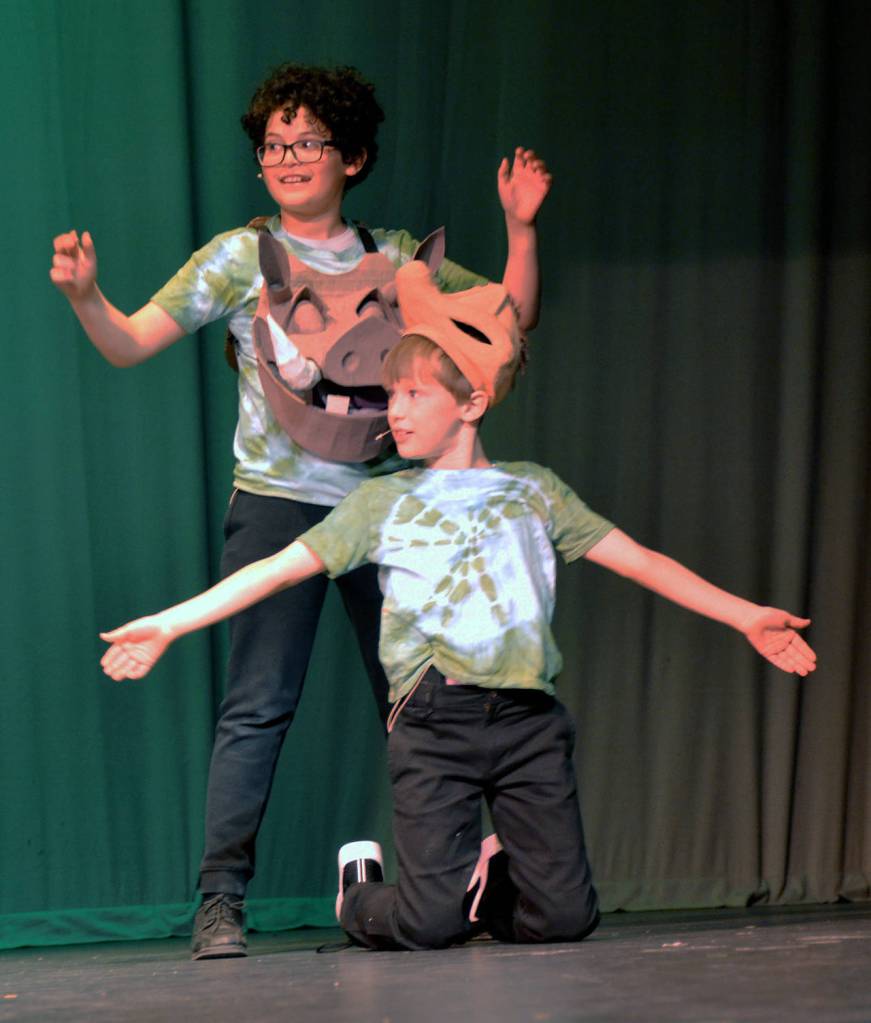 (Photo by Tifanie Kelly) David Miramontes, left, plays Pumbaa and Ethan Parris plays Timon.