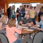 DAN HAMMOCK | THE DAILY WORLD                                About 150 people attended the Department of Transportation Heron Street Bridge replacement open house at the Rotary Log Pavilion Wednesday. They were able to speak to Department of Transportation representatives about the four bridge replacement options and provide written comments.