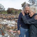 Gov. Jay Inslee of Washington talks with Marsha Maus, 75, a 15-year resident of Seminole Springs Mobile Home Park, whose home in Agoura Hills, Calif., was destroyed by the Woolsey fire. (Mel Melcon/Los Angeles Times)