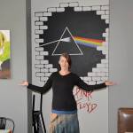 DAN HAMMOCK | GRAYS HARBOR NEWS GROUP Local artist Nina Yates with some of her works on display at the RocknBrews restaurant in Westport, due to open April 1. Behind her is a mural that combines the unmistakable art from Pink Floyds The Wall and Dark Side of the Moon albums. The canvases feature artists with local roots, Kurt Cobain of Nirvana and Leroy Virgil of Hellbound Glory.