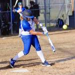 Elmas Chloe Velasco hits a double in the fifth inning against Pe Ell-Willapa Valley on Thursday. (Hasani Grayson | Grays Harbor News Group)
