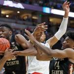 Florida States Mfiondu Kabengele (25) and Terance Mann (14) of the Florida State Seminoles fight for the rebound against Gonzagas Rui Hachimura during the 2019 NCAA Mens Basketball Tournament West Regional on Thursday. (Sean M. Haffey/Getty Images/TNS)
