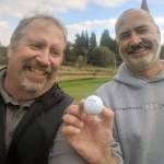 Pat Gouchner, right, is all smiles after hitting a hole-in-one on the No. 7 hole at Grays Harbor Country Club on Friday. Gouchners ace was witnessed by Rick Moore, left. (Submitted Photo)