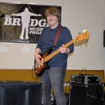 (Louis Krauss | Grays Harbor News Group) Gabe Turpin plays the bass at a rehearsal for the Bridge Music Project last week.