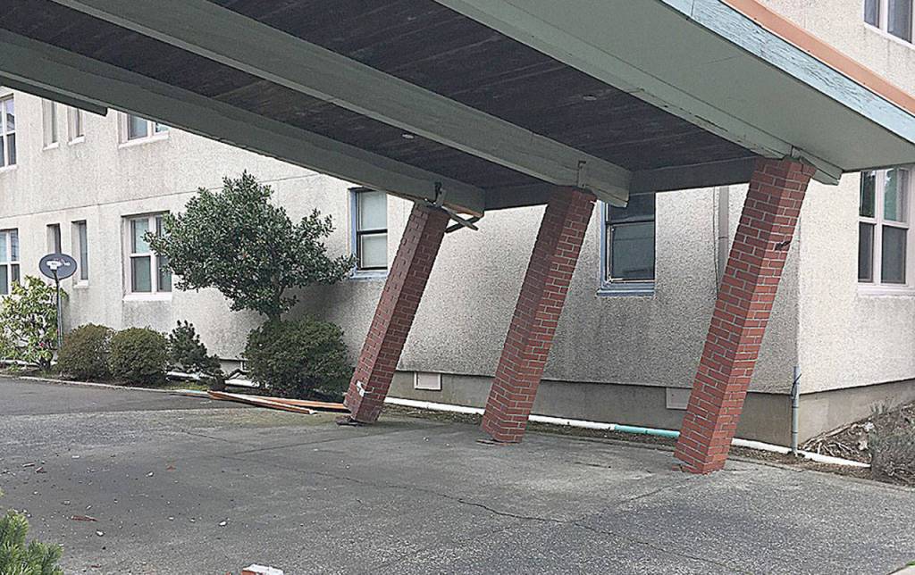 COURTESY ABERDEEN POLICE DEPARTMENT                                The drive-thru entrance to Journey Travel in Aberdeen was damaged Saturday afternoon when a hit and run driver struck it with a rental truck. Damage to the truck and building is estimated at $50,000.