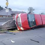 COURTESY HOQUIAM POLICE An 18-year-old Raymond man and an 18-year-old passenger were in this pickup when it was involved in a two car rollover crash on the south end of the Simpson Avenue Bridge Tuesday evening. The passenger was taken to the hospital with a minor injury.