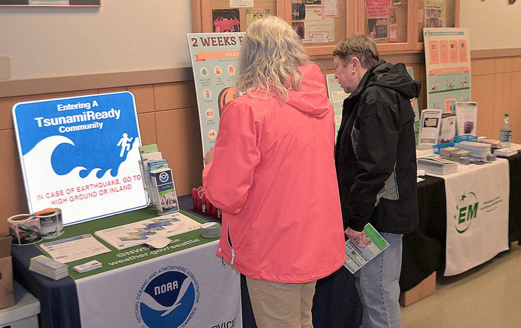DAN HAMMOCK | GRAYS HARBOR NEWS GROUP                                People who attended the Tsunami Road Show presentation at Aberdeen High School Wednesday took home a variety of free information on how to prepare for and survive a disaster.