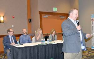 DAN HAMMOCK | GRAYS HARBOR NEWS GROUP                                Dru Garson, CEO of Greater Grays Harbor Inc., right, introduces the panel at the opportunity zones presentation in Ocean Shores April 11. From left: Craig Nolte, Federal Reserve Bank of San Francisco; Kyle Wise, Thurston County Economic Development Council; Julie Knott, Clallam County Economic Development Council; and Melissa LaFayette, National Development Council.