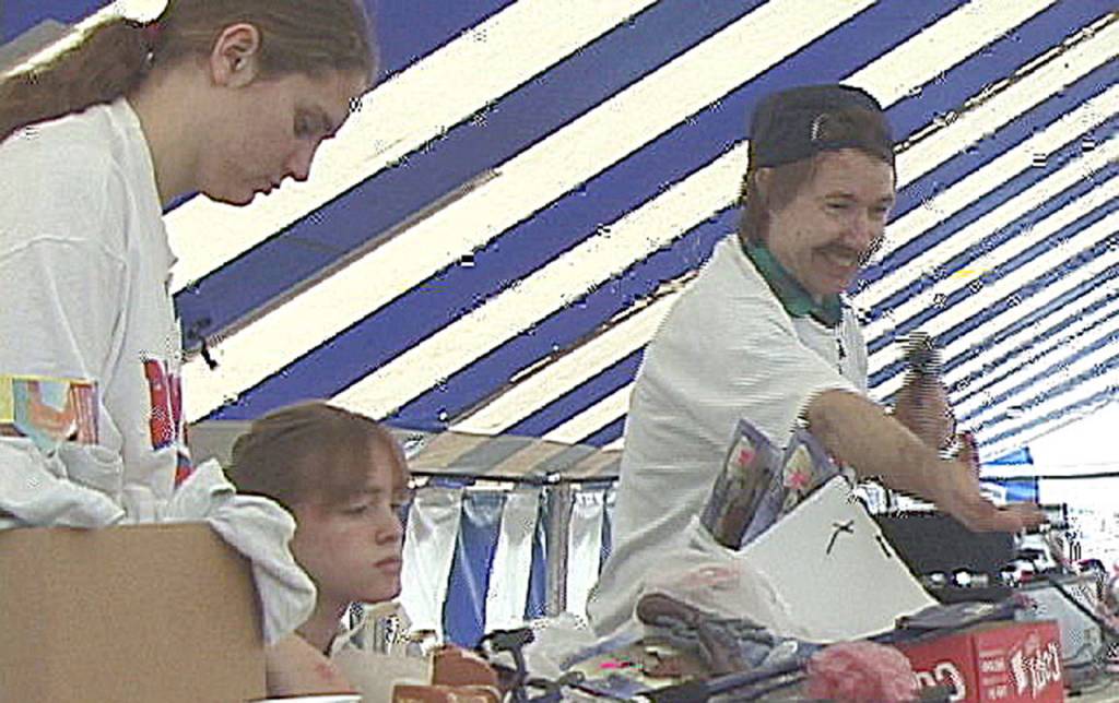 COURTESY WESTPORT GRAYLAND CHAMBER                                Jim Mankin announces winners of last years crab races with Sandy Mullvain.